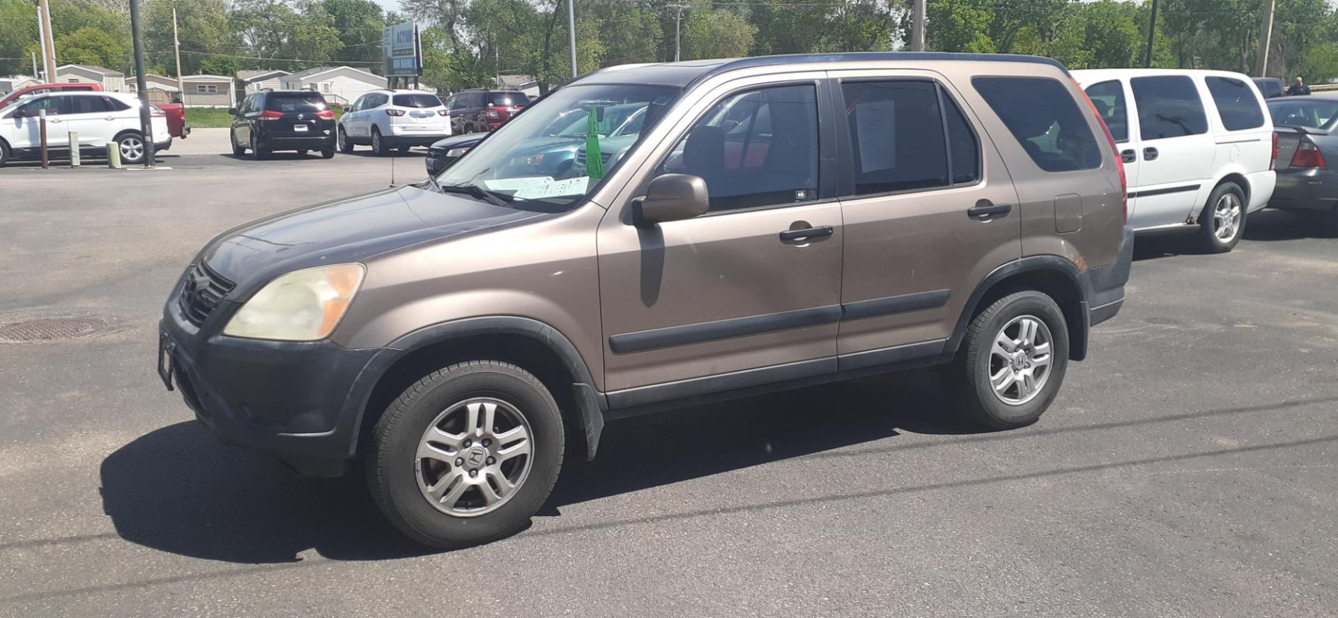 2004 Honda CR-V (JHLRD78854C) with an 2.4L L4 DOHC 16V engine, 4-Speed Automatic Overdrive transmission, located at 2015 Cambell Street, Rapid City, SD, 57701, (605) 342-8326, 44.066433, -103.191772 - CARFAX AVAILABLE - Photo#1